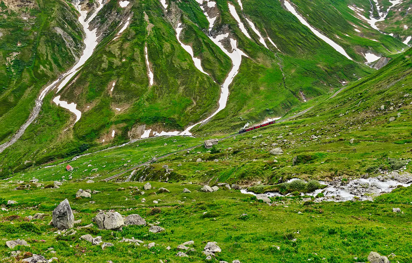 Steam train on the Furka mountain line below the Furka summit tunnel